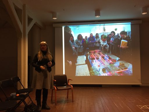 Artist and curator Eva Bakkeslet presenting Gentle Actions exhibition. Photo: Oslofjord ecologies.